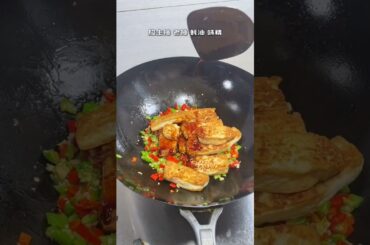 Braised tofu with chopped green and red pepper, this dish is very delicious