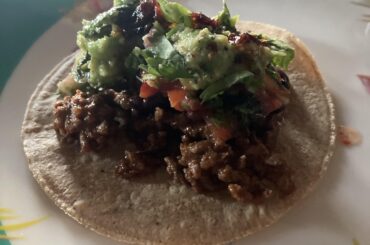 Some homemade soft tacos. W homemade guacamole and salsa.