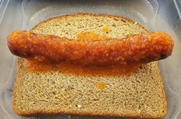 A spicy dogger with my homemade ghost pepper/habanero/sweet mini pepper sauce