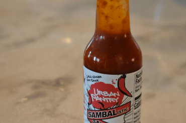 Great combo with Asian food... Medium heat with a lovely garlic and ginger forward flavor profile.