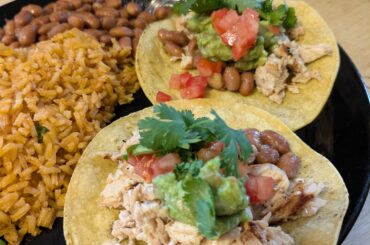 Homemade tacos, beans and rice