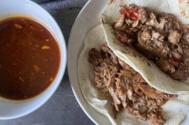 Seared and braised pork - used my home grown chiles - serranos, jalapenos, and more, onion, garlic, san marzano tomatoes. Salt, pepper, cumin, and garlic powder. Yeah, flour tortillas because it is what I had today.