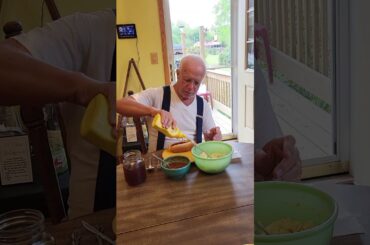 Charley Enjoying a Hotdog.- What do you put on yours?