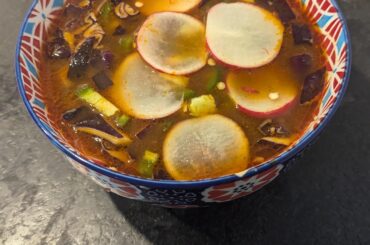 Pozole Rojo with radishes, jalapenos and red cabbage as sides.