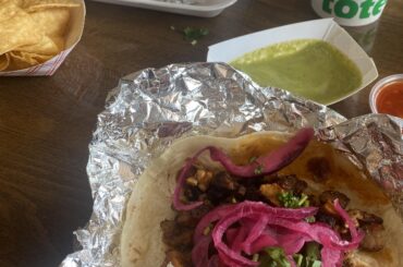 Two pork adobada tacos, side and a drink for $11. The salsa bar and self serve chips puts this place at the very top.