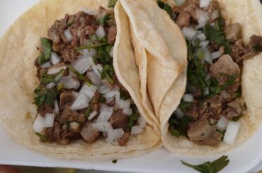 Lengua tacos. Stacked with meat.