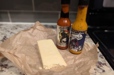 One of my favorite pairings. A block of asiago cheese with Garlic Reaper or Reaper Squeezins