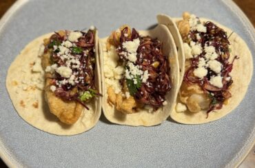 modelo beer battered grouper, purple cabbage slaw with cilantro-lemon juice-salsa macha, queso fresco