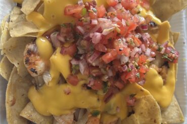 Thursday night snack. Loaded Nachos, but this time with shrimp and homemade pico de gallo.