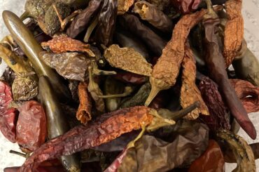 First year growing super hots. My FIL put in amazing work smoking these beauties yesterday!!