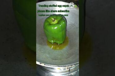 Trending stuffed egg capsicum #shorts #youtubeshorts #egg capsicum #food #villagecooking