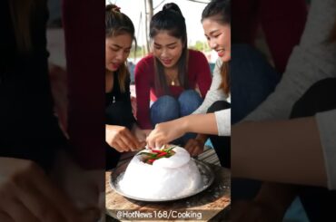 293 Giant Fish Baked Inside a Salt Dome with Chili Leaves