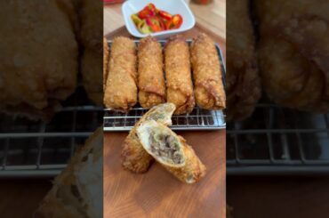 SAVE this recipe for Game Day! Cheesy Cheesesteak Egg Rolls #recipe #eggrolls