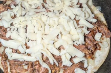 Quesadilla with shredded beef and salsa verde