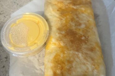 Correct me if I’m wrong but isn’t this beef grilled cheese burrito supposed to be bigger? Nacho cheese side for scale