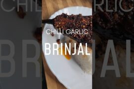CHILLI GARLIC BRINJAL 🍆 Garlicky goodness with a chilli punch #shorts #chilligarlicbrinjal #yummy
