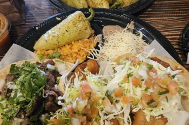 Three tacos: fish, beef, and shrimp