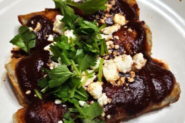 Chicken and Green Chili Enchiladas with a red chili sauce