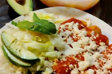 Dinner. Enchiladas refried beans and chile manzano