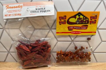 Two very different looking pequin chiles.