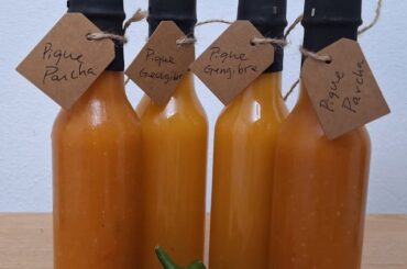 Pashionfruit and ginger hotsauces prepared by me with appocalypse scorpion from my garden