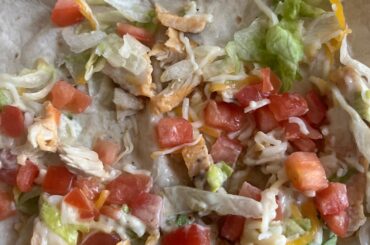 New Chicken Avocado Stacker - count your days Taco Bell. Basically a wrap with lettuce and tomatoes and like 4 pieces of chicken.