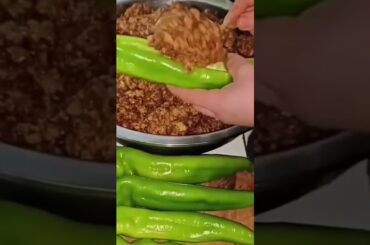 the stage of filling a large chili in a special filling, poured according to the measurements