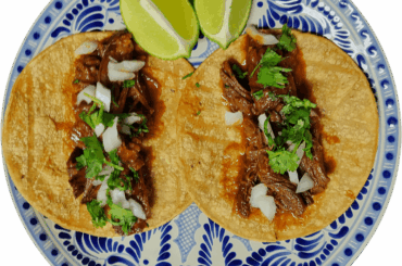 Unos tacos de costilla de res.