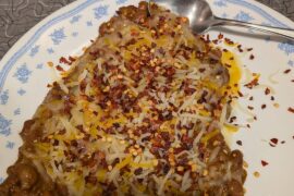 Breakfast of champions deconstructed French Mexican and and Texas omelette. Eggs and canned chili beans