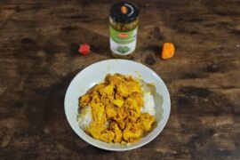 Ashari Chicken Curry with Habaneros, Chili Pickle, homegrown Scorpion Peppers, and Coconut Milk