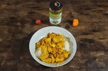 Ashari Chicken Curry with Habaneros, Chili Pickle, homegrown Scorpion Peppers, and Coconut Milk