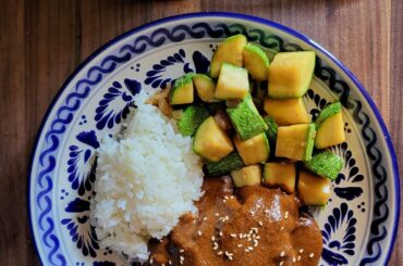 Served up an early dinner. Ending a day of hardwork with our Mole Casero and then off to do homework.