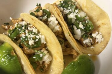 Tacos: Chicken, jalapeno, cilantro, onion, lime, cheese.