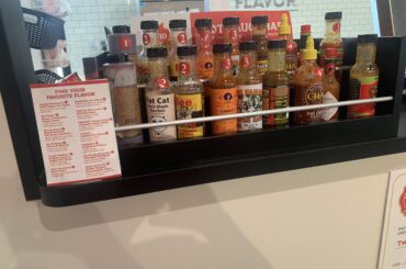 A variety of free self serve hot sauce flavors at firehouse subs.