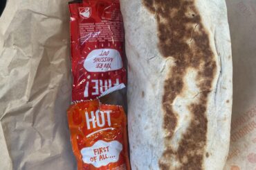 pretty decent budget burrito, cheesy bean and rice add steak, onions, and potatos and get it grilled. sauce packets for scale, price will vary by location (one location may charge .80 for onions, others may have it free, ect)