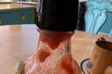 What is this brown stuff in my Frank’s RedHot?