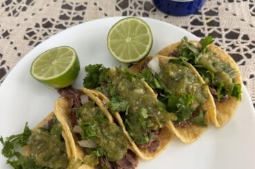 Beef tacos and salsa verde
