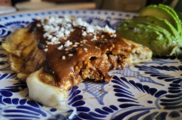 Carnitas and mole omelette for breakfast.