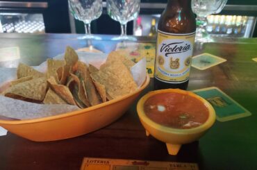 Fairly smooth, with chunks of onion in it. Not a bad Salsa for free at the bar. Rancho Grande Bar and Grill, Port Arthur, TX.