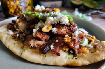 I gave my lady the last 2 tortillas and used garlic naan for me. It was daaaamn good.