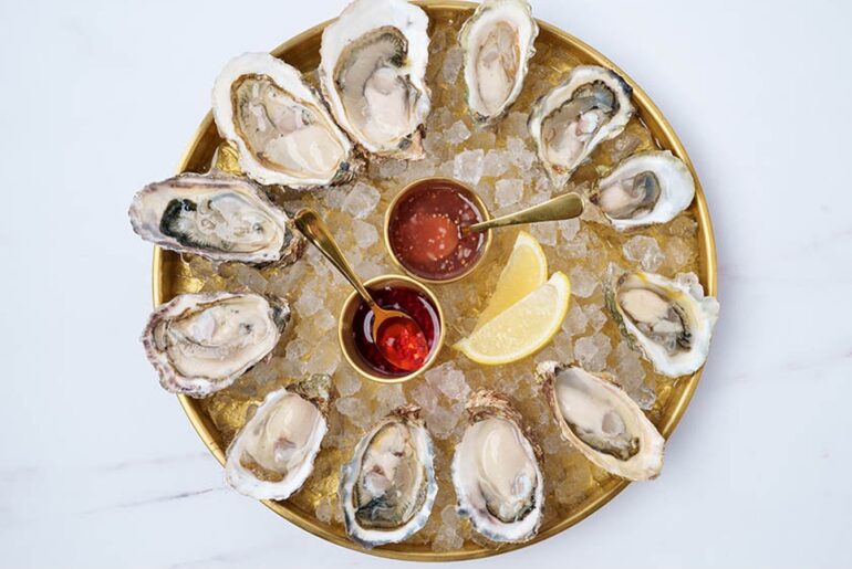 Unique Toppings To Try On Oysters, According To An Oyster Farmer