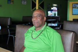 Tony Scott created the combination plate on the menu so customers didn’t have to choose between their favorite meats. For first time customers, he recommends people try the jerk chicken and oxtail ($25). (Katlynn Fox/Community Impact)