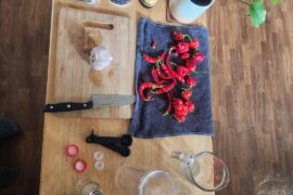 Second try at homemade hotsauce (reapers and cayennes)