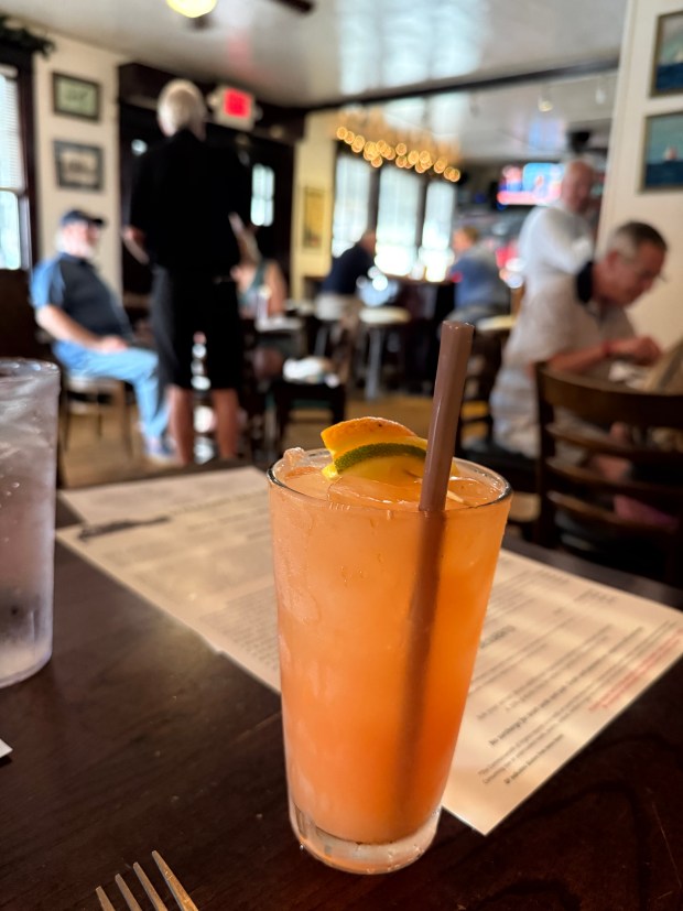 Tautog's Hurricane Punch features a refreshing blend of tropical fruit vodka, lime, amaretto, Triple Sec, pineapple and orange juice with a splash of Sprite. (Stacy Parker/The Virginian-Pilot)