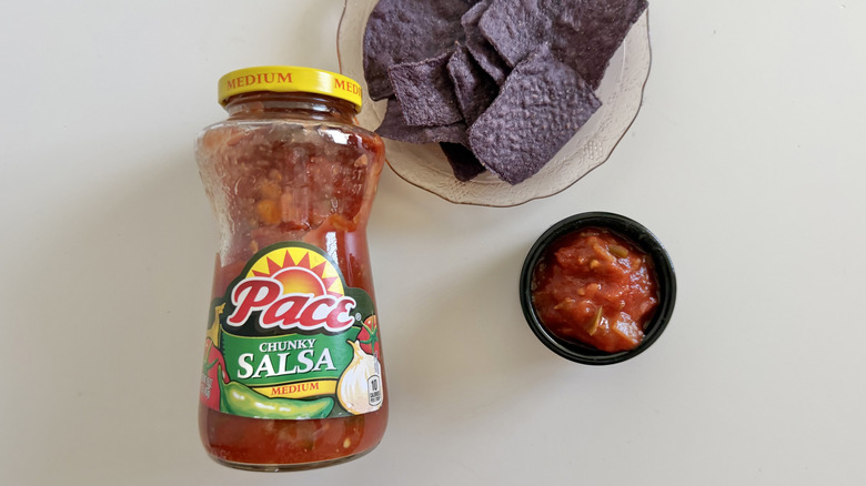 Chunky Medium salsa jar near chips