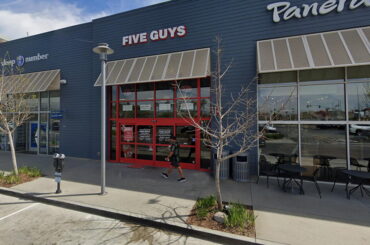 Teenage Five Guys worker hit by stray bullet while on the job