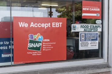 A sign in an Indianapolis store shown on Aug. 1, 2023, says SNAP benefits are accepted. A new analysis by the Congressional Budget Office projects 2.4 million fewer people per month will participate in the program under Republicans’ tax cut and spending law. (Photo by Getty Images)