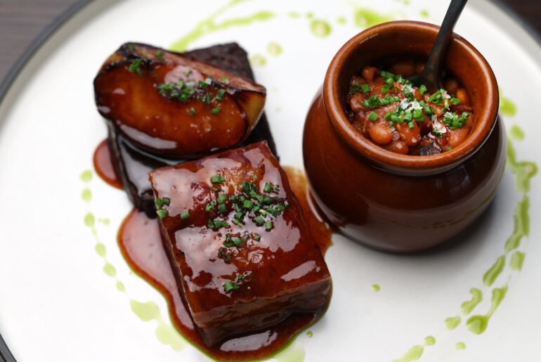 The cider-glazed pork belly at The Puddle Dock restaurant in Portsmouth, New Hampshire.