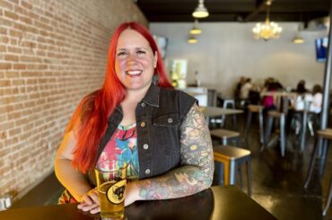 Advanced cicerone Rachel Benkowski sits in the Mesa taproom Phantom Fox Beer Co.
