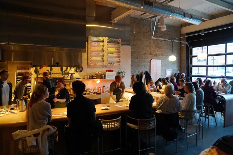 Guests patronize ROSY, a new Cleveland restaurant by Chef Vinnie Cimino and business partner Andrew Watts, during a "friends and family" night at the establishment.
